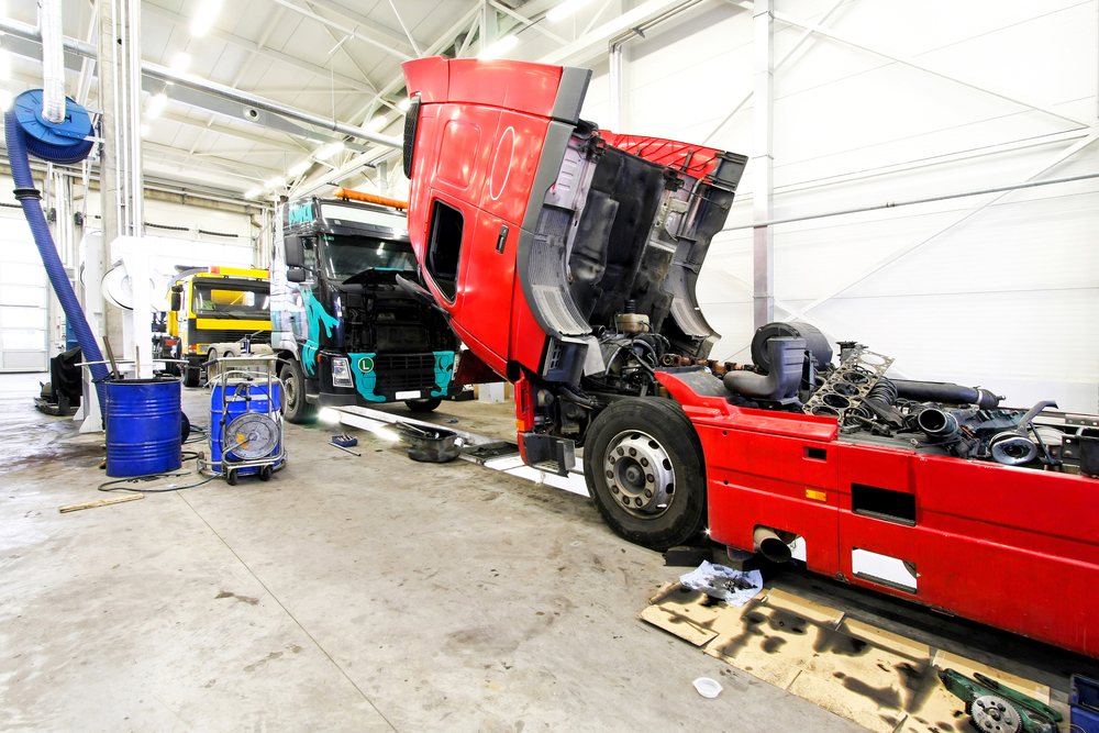 Truck being serviced with new truck parts