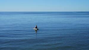 A person in a kayak off the coast of Busselton.